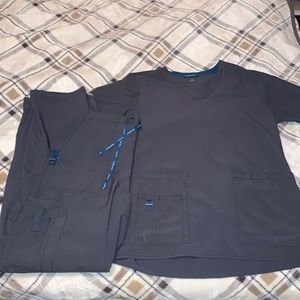 Women’s size small Carhartt Scrubs - 3 sets
